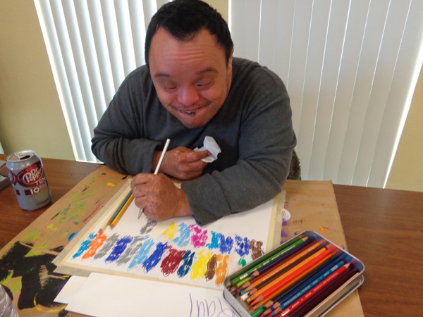 man with art supplies