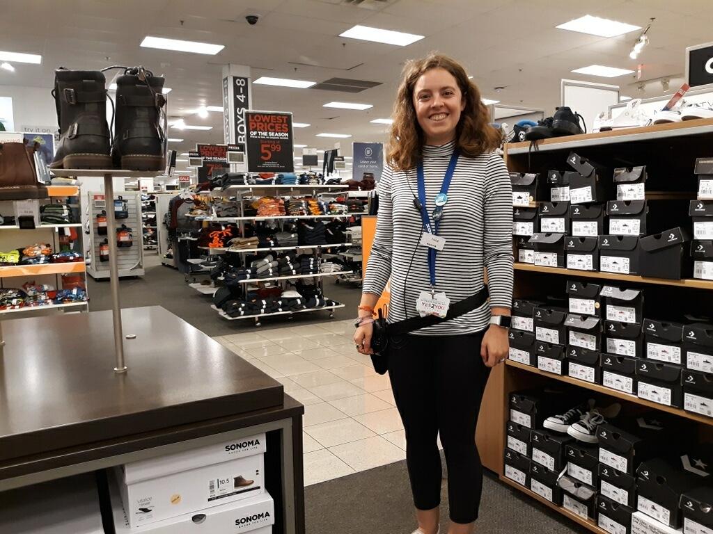 young woman working in a shoe department